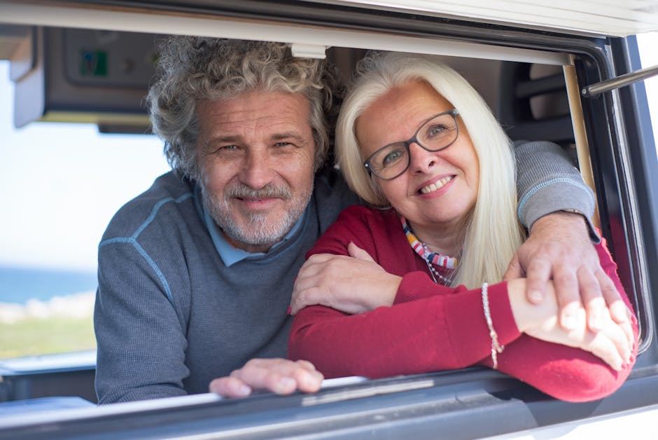 Best car insurance for seniors discount review: cheerful senior couple reviewing their auto policy paperwork, the annual sit-down that uncovers the best car insurance for seniors discounts almost every carrier hides from online quote forms