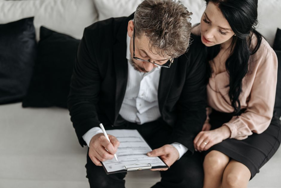 No medical exam life insurance review with a couple reading their policy documents together, the annual no medical exam life insurance check-up that confirms coverage still matches the family's needs